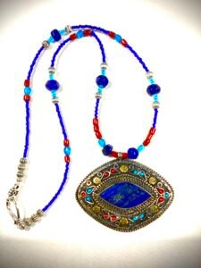 lapis center with inlaid precious stones