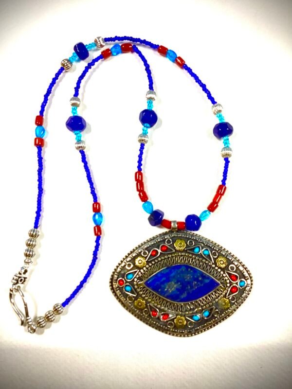 lapis center with inlaid precious stones