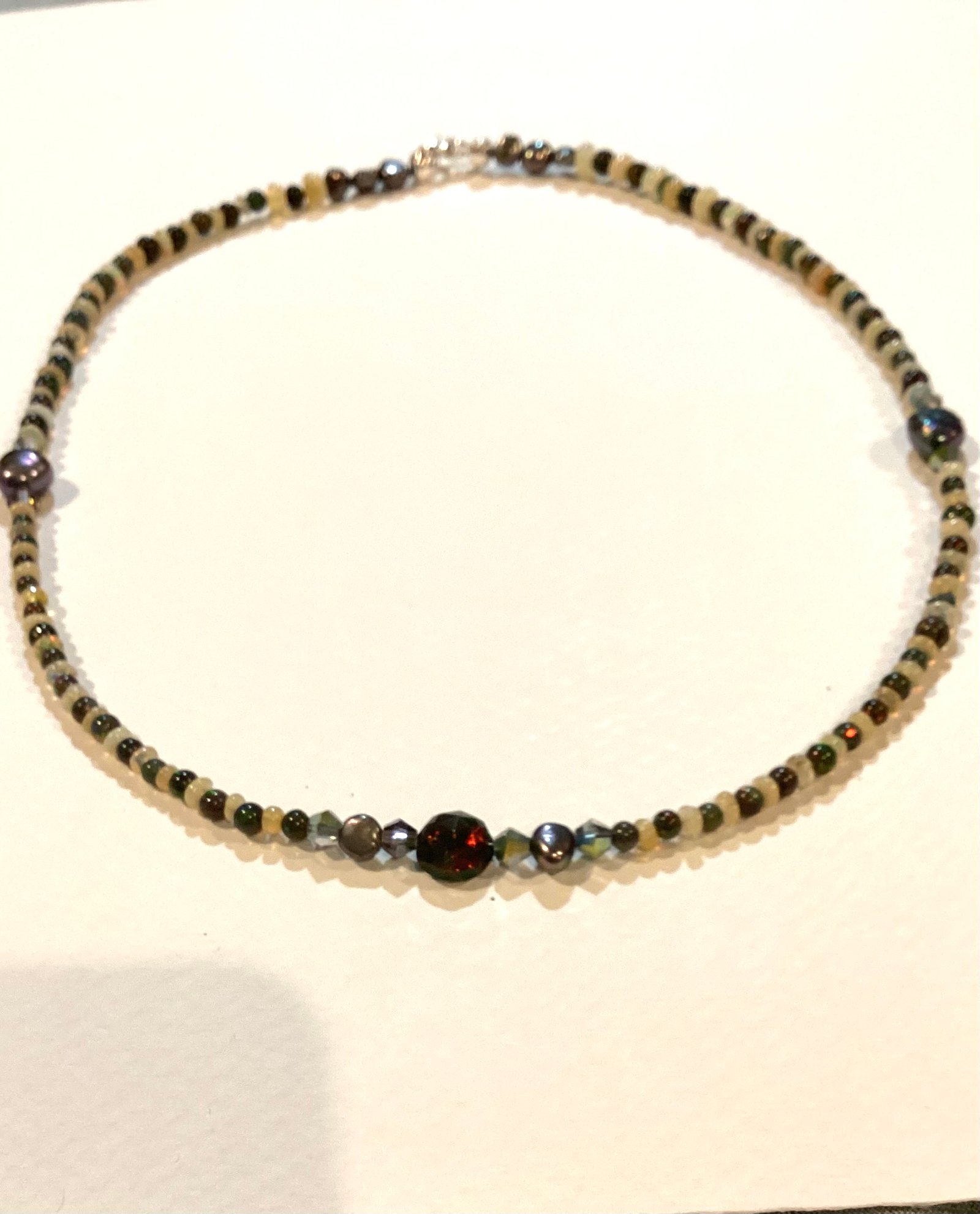 white and black opal; large center black opal