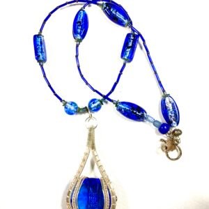 faceted sapphire in sterling wrap
